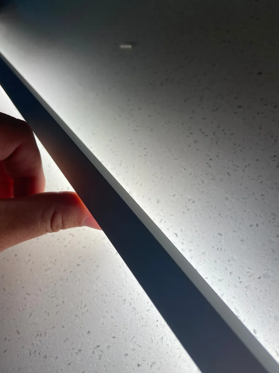 Light strip placed at the back of the cabinet